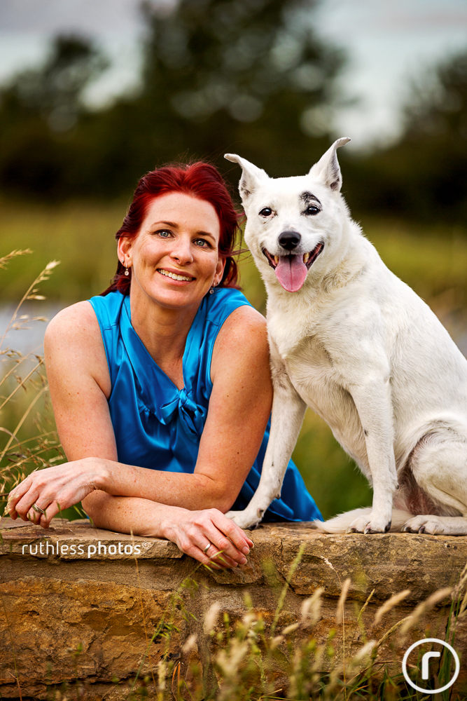 smiling dog with female owner